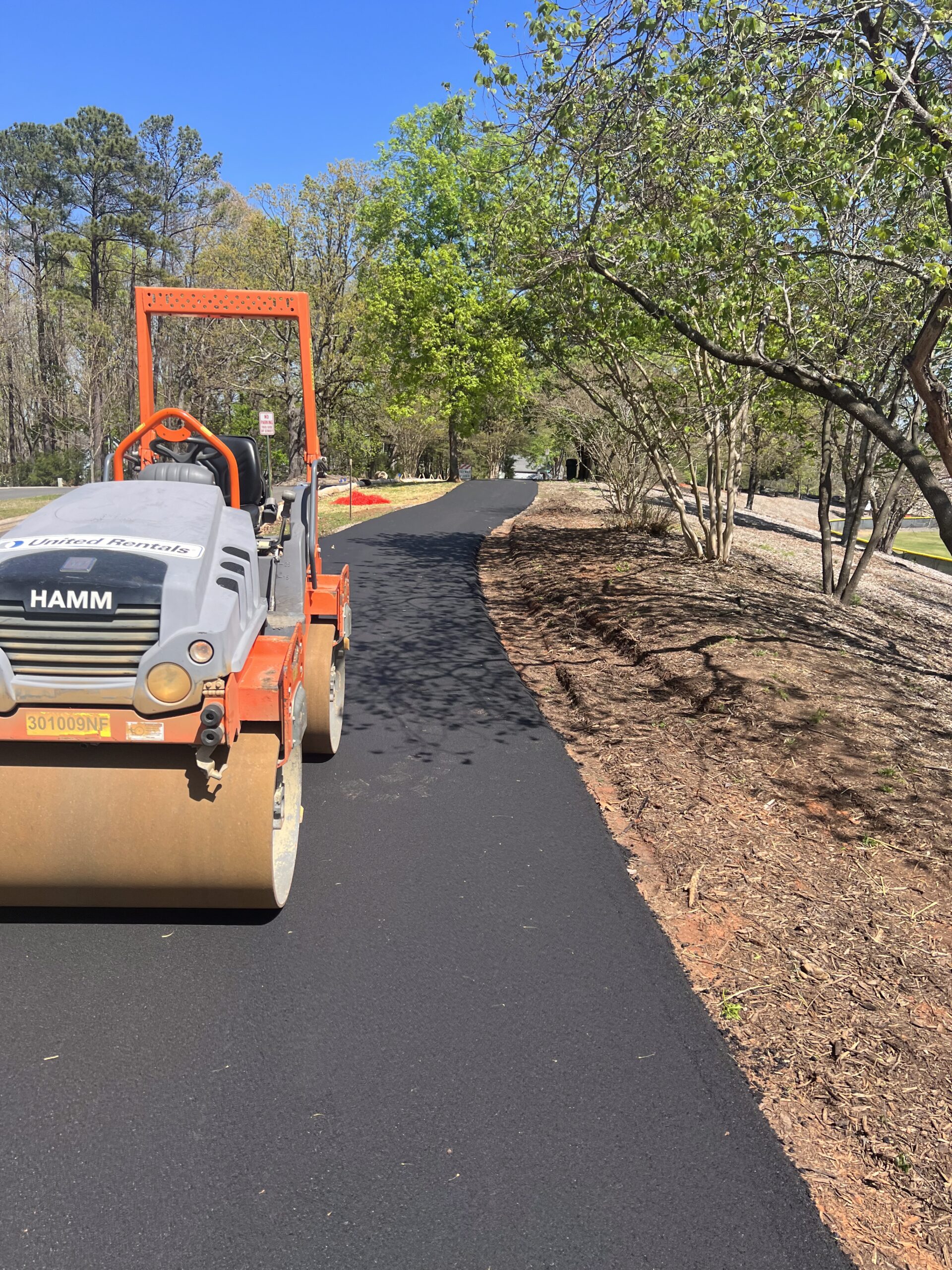 Freshly paved asphalt driveway